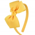 Detailed view of the bright yellow ribbed fabric texture on the girls' bow headband - Bright Yellow (09#)