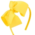 Gros plan d'un nœud en ruban gros-grain jaune de 5 pouces sur un serre-tête pour fille - Bright Yellow (05#)