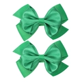 Detail view of two green grosgrain ribbon hair bows with double-layered handmade design - Green