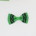 Green grosgrain ribbon hair bow with black wavy trim and symmetrical princess style design - Dark Green