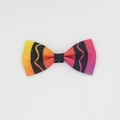 Detail of a small handmade rainbow gradient bow hairclip with black wavy stripes and patterns - Deep Multi-color