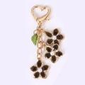 Portachiavi con fiori marroni e chiusura a cuore per accessori borsa donna - Serie Nera