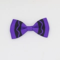Detailed macro view of purple and black wavy striped grosgrain ribbon handmade bow hair clip - Purple