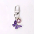 Cute butterfly keychain with purple floral pendant and silver alloy lobster clasp hardware - Purple Dotted Butterfly