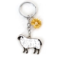 Niedlicher Schaf-Schlüsselanhänger mit Gänseblümchen-Anhänger an einer silbernen Kette - Schaf mit Gänseblümchen