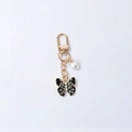 Sparkling black butterfly keychain with tiny diamonds and heart pearl detail - Black Sparkling Rhinestone Pearl Butterfly