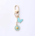 Golden butterfly and daisy keychain with white pearls and blue enamel charms - Blue Butterfly And Flower Style (海星蝴蝶)
