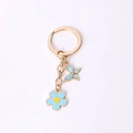 Sky blue flower and butterfly charm keychain with golden metal ring attachment - Blue Flower And Butterfly