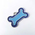 Detail of blue enamel bone-shaped pet ID tag with durable zinc alloy frame and ring - 40*25mm / Blue Frame