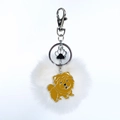 Détail du pompon blanc, du pendentif Chow Chow et de la patte sur porte-clés argenté - Chow-Chow Jaune