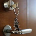 Cartoon Boston Terrier metal keychain with triple pendant design on a door key - Black and White Terrier / 10cm
