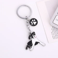 Hunde-Schlüsselanhänger aus Metall mit Boxer-Anhänger und Pfotenabdruck-Charm am Ring - Boston Terrier