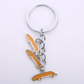 Silver metal dachshund keychain with three bright orange enamel dog pendants and ring - Long Sausage String