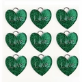 Macro detail of nine green glitter heart tags with Love engraving and silver rings - 30MM / Green