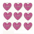 Detailed view of nine heart-shaped pink glitter metal pendants with Love engraving - 30MM / Rose Red