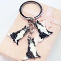 Border Collie enamel dog keychain with three charms on a gift box for holiday gifting - Border Collie Mix