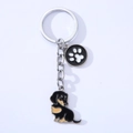 Detail of silver dachshund metal keychain with enamel paw print charm and dog pendant - Dachshund/Small Paw (Black) / Black