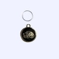 Detailed view of a round zinc alloy pet ID tag with a silver cat relief on black enamel - 2.5cm / Black Cat