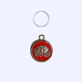 Zinc alloy pet tag detail showing a red enamel round frame with a sleeping grey cat motif - 2.5cm / Red Cat