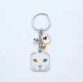 White cat keychain with heterochromia eyes and silver bell on a metal ring - Square White Cat