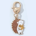 Süßer Emaille-Igel-Schlüsselanhänger mit goldenem Herz-Karabinerverschluss - Reisähren-Igel