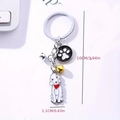 Cartoon Poodle Keychain with white puppy pendant, paw tag, and colorful bells - Silver Poodle (Bell)