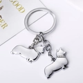 Detail shot of shiny silver alloy key ring with two Corgi charms and sparkling rhinestones - Corgi / 10cm