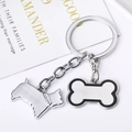 Détail d'un porte-clés argenté avec terrier en strass et pendentif en os émaillé noir - Yorkshire Os / 10cm