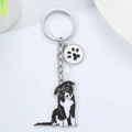 Cartoon Border Collie keychain with black and white metal charm and paw print detail - Border Collie Style (Border Collie & Paw Print)