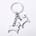 Porte-clés chien en métal poli avec deux pendentifs teckel et petits yeux en strass brillant - Teckel / 10cm