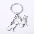 Silver dog keychain featuring two German Shepherd silhouettes with rhinestone collars - Double German Shepherd / 10cm