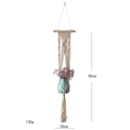 Detail of handmade cotton macrame wall hanging with 80cm height and 20cm width specs - Style C / Beige