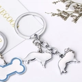 Porte-clés chien en métal argenté avec breloques de colley, strass et détails bleus - Sheltie / 10cm