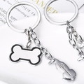 Set de porte-clés chien argenté avec charm os et pendentif teckel orné de cristaux - Labrador Os / 10cm