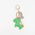 Détail de breloque cheval en cuir PU vert avec pompon rayé et pendentif sac d'argent doré - Vert