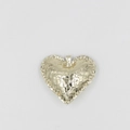 Detailed view of heart-shaped gold keychain pendant with unique hammered metal texture - Gold