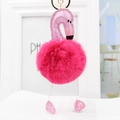 Close-up of pink glitter flamingo head and fluffy magenta pom-pom keychain details - 18*8cm / Rose Red