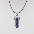 Detail of blue sodalite hexagonal prism pendant with silver clasp and wax cord - Blue and White Porcelain