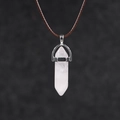 Detail of hexagonal pink quartz crystal pendant with silver clasp on brown cord - Rose Quartz