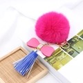 Fuchsia fluffy fur pom pom keychain with pink crystal bow and blue leather tassel - Pink Bow Blue Tassel