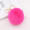 Detail of soft rose red faux fur pompom keychain with golden metal lobster clasp - Rose Gold