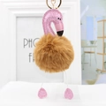 Close-up of flamingo plush keychain with pink glitter leather and golden metal clasp - 18*8cm / Brown