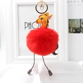 Detail view of red faux fur giraffe keychain with golden ring and lobster clasp - Red
