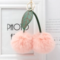 Pink faux fur cherry keychain with green leather leaves and gold metal ring fastener - Pink