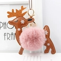Detail of reindeer keychain featuring brown leather, pink pompom and gold sequin antlers - Dusky Pink