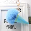Detail of blue ice cream fur pom pom keychain with quilted PU cone and golden clasp - Blue