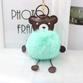 Light green faux fur bear pompom keychain with brown leather accents and gold hardware - Mint Green