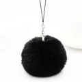 Detail of soft black faux rabbit fur pompom keychain with silver metal clasp - Black