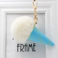 Detail of ice cream keychain with white fur ball and sky blue leather cone decoration - Off White