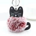 Niedlicher schwarzer Katzenplüsch-Schlüsselanhänger mit rot-weißem Kunstfell-Bommel - Weinrot Und Weiß Mit Silberring